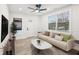 Bright living room featuring a comfy sofa and large windows at 1288 Almont Sw Dr, Atlanta, GA 30310