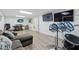 Finished basement with L-shaped sofa and drum set at 1051 Rock Springs Rd, Lawrenceville, GA 30043