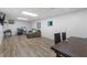 Finished basement with L-shaped sofa and drum set at 1051 Rock Springs Rd, Lawrenceville, GA 30043