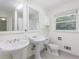 Clean bathroom with double vanity and window at 1051 Rock Springs Rd, Lawrenceville, GA 30043