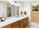 Bathroom features a double vanity and separate toilet area at 1051 Rock Springs Rd, Lawrenceville, GA 30043