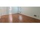 Bright bedroom with wood flooring and access to bathroom at 1051 Rock Springs Rd, Lawrenceville, GA 30043