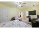 Bedroom with a bed, desk, and access to bathroom at 1051 Rock Springs Rd, Lawrenceville, GA 30043
