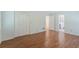Bedroom with wood floors, white doors and en-suite bathroom at 1051 Rock Springs Rd, Lawrenceville, GA 30043