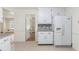 Kitchen with granite countertops and white cabinets at 1051 Rock Springs Rd, Lawrenceville, GA 30043