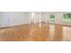 Spacious living area with hardwood floors and multiple windows at 1051 Rock Springs Rd, Lawrenceville, GA 30043