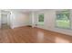 Bright living area with hardwood floors and large windows at 1051 Rock Springs Rd, Lawrenceville, GA 30043