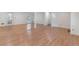 Open living space with light hardwood floors and access to a patio at 1051 Rock Springs Rd, Lawrenceville, GA 30043