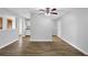 Bright dining room features wood-look floors and ceiling fan at 5854 Bobbin Ln, Lithonia, GA 30058