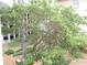 Landscaped courtyard with mature trees and greenery at 3777 Peachtree Ne Rd # 1021, Atlanta, GA 30319