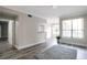 Spacious living room with wood-look floors and a grey rug at 3777 Peachtree Ne Rd # 1021, Atlanta, GA 30319