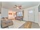 Living room with hardwood floors and ceiling fan, offering a cozy atmosphere at 3150 Humphries Se Dr, Atlanta, GA 30354