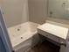Bathroom with jetted tub and vanity at 837 Crestwell Sw Cir, Atlanta, GA 30331