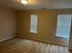 Bright bedroom with neutral walls, carpet, and two windows at 837 Crestwell Sw Cir, Atlanta, GA 30331