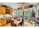 Bright breakfast nook with built-in cabinetry and views of the backyard at 3014 Oaktree Ne Ct, Marietta, GA 30066