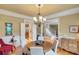 Elegant dining room featuring a chandelier and hardwood floors at 3014 Oaktree Ne Ct, Marietta, GA 30066