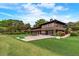 Community clubhouse with patio and putting green at 68 Montre Nw Sq, Atlanta, GA 30327