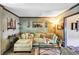 Spacious living room featuring a comfortable sectional sofa and large windows at 68 Montre Nw Sq, Atlanta, GA 30327