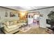 Spacious living room featuring a comfortable sectional sofa and large windows at 68 Montre Nw Sq, Atlanta, GA 30327
