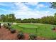 Enjoy a putting green next to a pond at 68 Montre Nw Sq, Atlanta, GA 30327