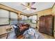 Sunroom with comfortable seating and large windows at 68 Montre Nw Sq, Atlanta, GA 30327