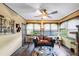 Sunroom with comfortable seating and large windows at 68 Montre Nw Sq, Atlanta, GA 30327