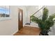 Bright entryway with hardwood floors and a view of the staircase at 1690 Mcconnell Rd, Grayson, GA 30017