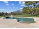 Freeform swimming pool with stone coping at 1690 Mcconnell Rd, Grayson, GA 30017