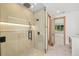 Elegant bathroom with a large walk-in shower and wood-like tile at 1840 Pilgrim Mill Cir, Cumming, GA 30041