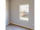 Simple bedroom with a window and carpeted floor at 148 Sourwood Ln, Temple, GA 30179