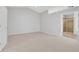 Large bedroom with neutral walls and carpet, offering ensuite bathroom access at 3297 Mcever Park Cir, Acworth, GA 30101