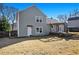 House exterior showcasing a two-story home with backyard access at 4765 Limestone Nw Ln, Acworth, GA 30102