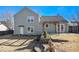 Rear view of house showing a two-story home with a patio at 4765 Limestone Nw Ln, Acworth, GA 30102