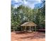 Quaint gazebo nestled in a wooded area at 3505 Adams Road Lot 2, Cumming, GA 30041