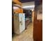 Kitchen with white refrigerator and wood cabinets at 25 Vermont Ave, Emerson, GA 30137