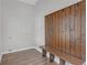 Laundry room with wooden bench and storage at 1543 Broad Ne St, Conyers, GA 30012