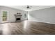 Living room with hardwood floors and fireplace at 2451 Napa Valley Dr, Villa Rica, GA 30180