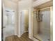 Bathroom featuring a large shower and access to another room at 129 Talon Pl, Mcdonough, GA 30253
