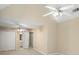 Spacious bedroom with high ceilings, ceiling fans, and walk-in closet at 129 Talon Pl, Mcdonough, GA 30253
