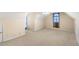 Large bedroom with vaulted ceiling and window at 129 Talon Pl, Mcdonough, GA 30253