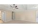 Main bedroom with neutral carpeting and access to the bathroom at 129 Talon Pl, Mcdonough, GA 30253