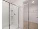 Shower with glass enclosure and built-in shelving at 524 Vervain Dr, Locust Grove, GA 30248