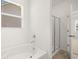 Relaxing bathroom with soaking tub and separate shower at 532 Vervain Drive, Locust Grove, GA 30248