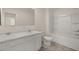 Clean bathroom with double vanity, bathtub, and shower at 532 Vervain Dr, Locust Grove, GA 30248