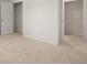 Spacious bedroom with double closets and neutral walls at 532 Vervain Drive, Locust Grove, GA 30248