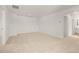 Spacious bonus room with neutral wall and carpet flooring at 532 Vervain Drive, Locust Grove, GA 30248