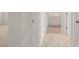 Hallway with carpet and access to bathroom and bedroom at 532 Vervain Drive, Locust Grove, GA 30248