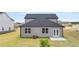 Two-story house with gray siding, and patio at 532 Vervain Drive, Locust Grove, GA 30248