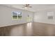 Large living room featuring hardwood floors and access to patio at 532 Vervain Drive, Locust Grove, GA 30248
