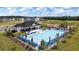 Community pool with a clubhouse, playground, and lounge chairs at 532 Vervain Drive, Locust Grove, GA 30248